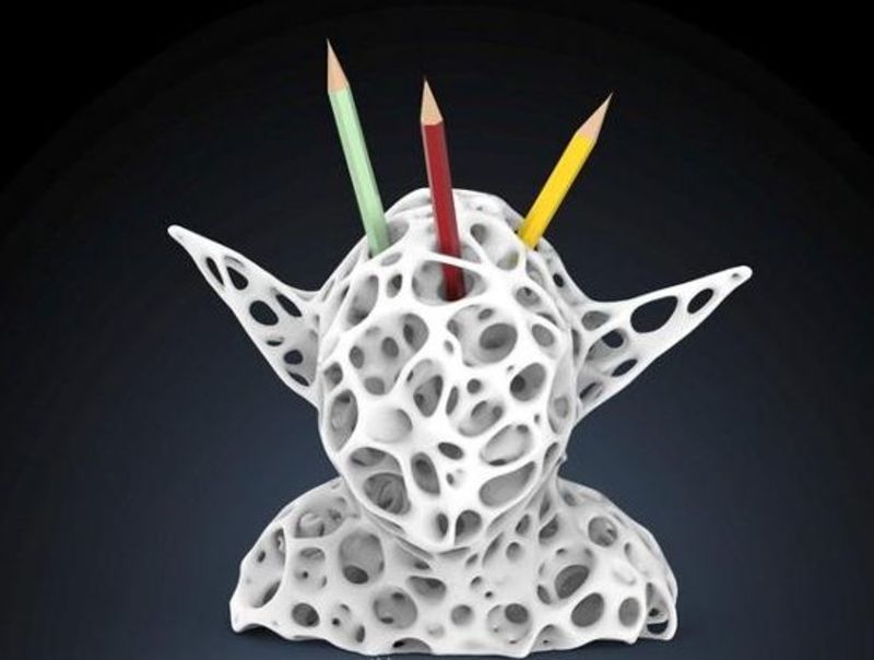 Holder pencils on your desk. Yoda bust