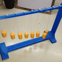 Pendulum Wave: Relating Wavelength to Frequency - Thumbnail 8