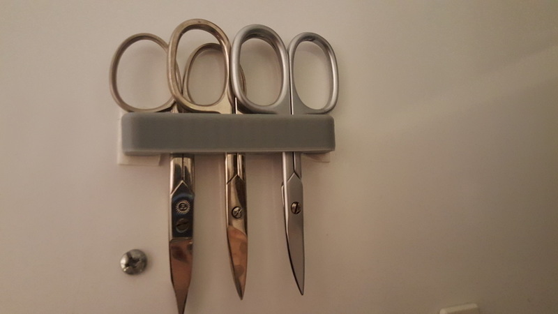 Scissors' support