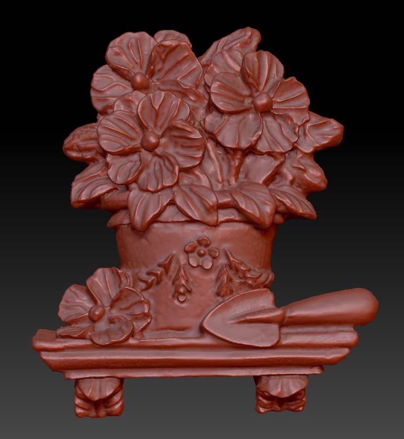 Pot of flowers on a shelf