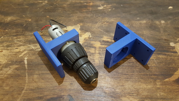 Cordless drill motor mechanism bracket