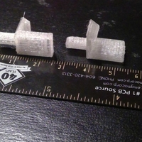 Shelf No-Tip Plug - Thumbnail 1