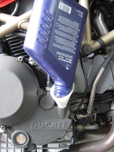 Elliptical oil funnel for Ducati