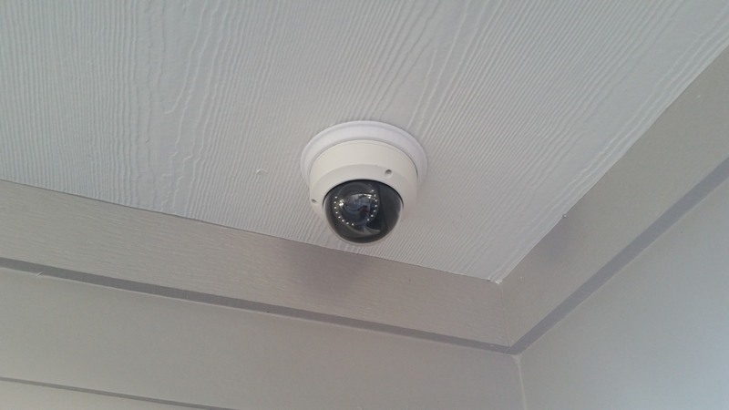 Security camera mount to gang box