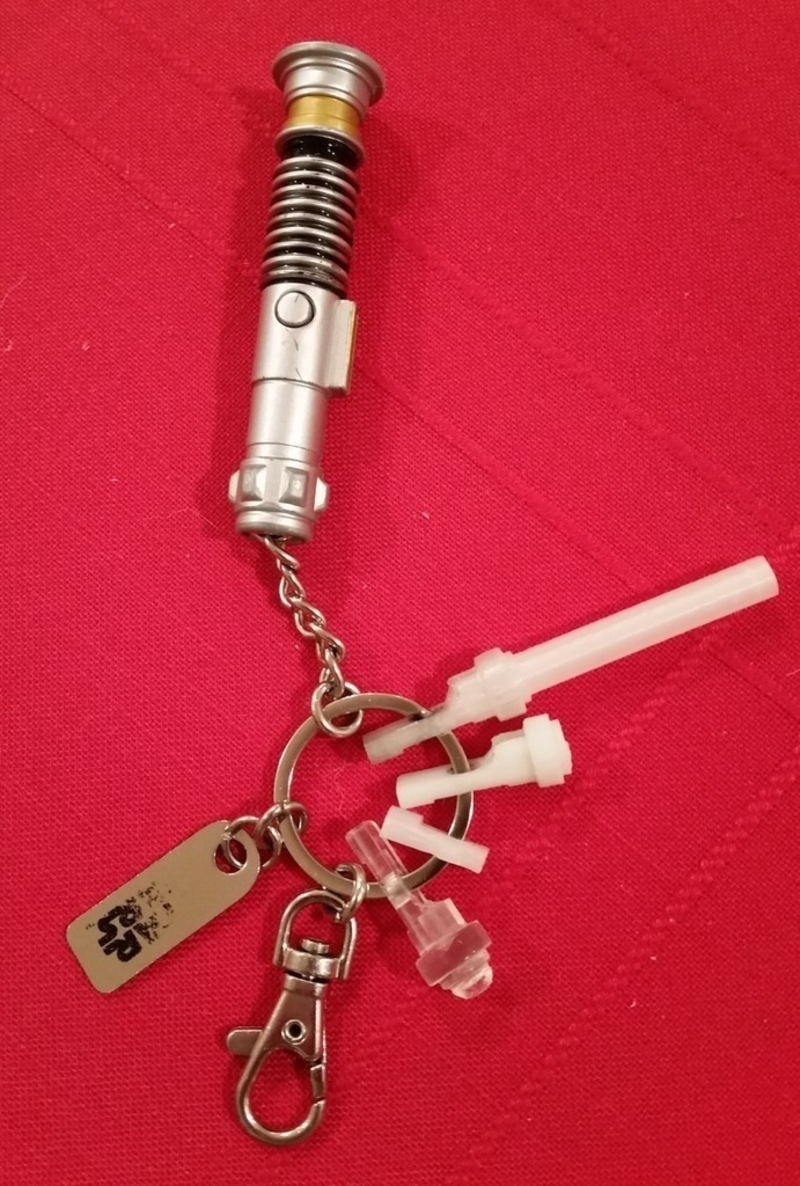 Disney lightsaber keychain repair