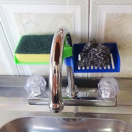 A sponge holder I designed and printed for my kitchen sink. I was tired of  leaving my sponge in the sink or on the edges, so this was my solution. :  r/3Dprinting