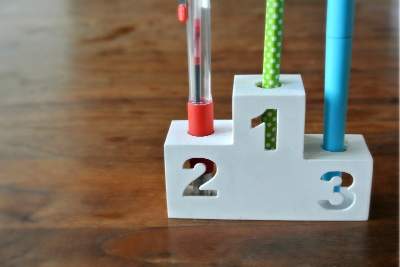 Winner's podium for pens