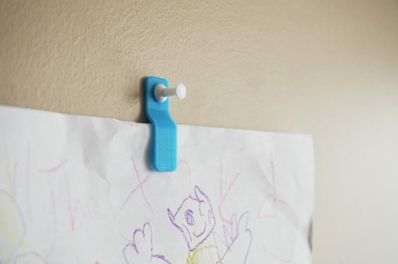 Wall mount paper clip