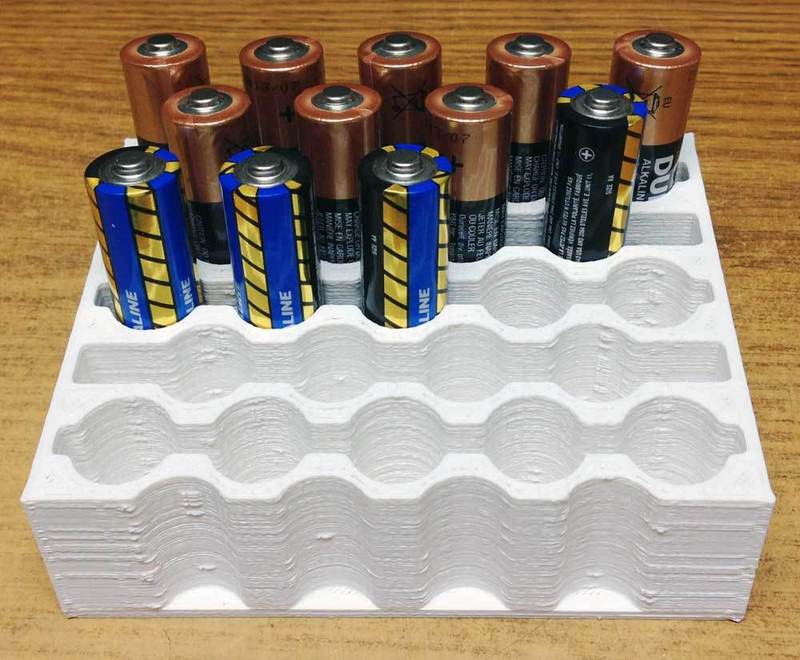 AA 23 Battery holder for desk or wall mount.