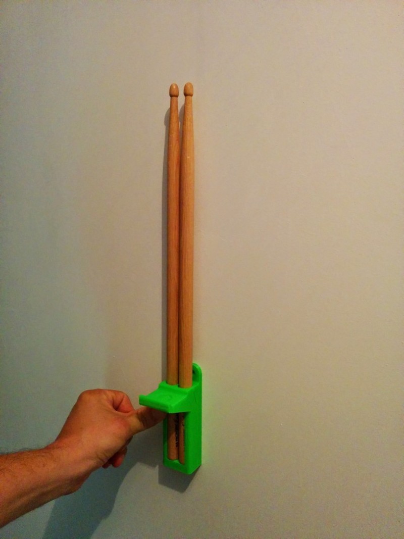Drum sticks and headphone support