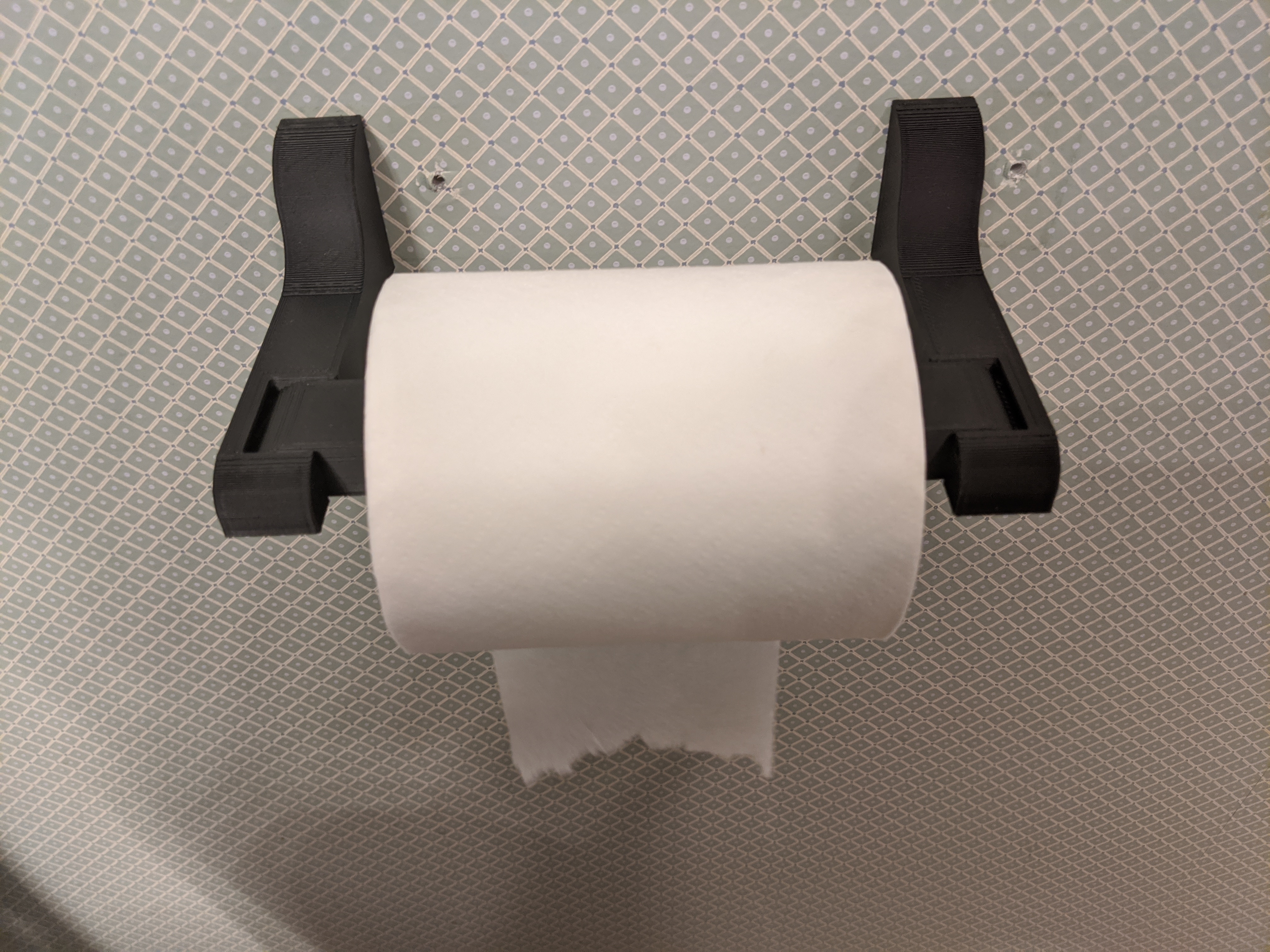 https://assets.pinshape.com/uploads/image/file/282829/print-in-place-quick-change-toilet-paper-paper-towel-holder-3d-printing-282829.jpg