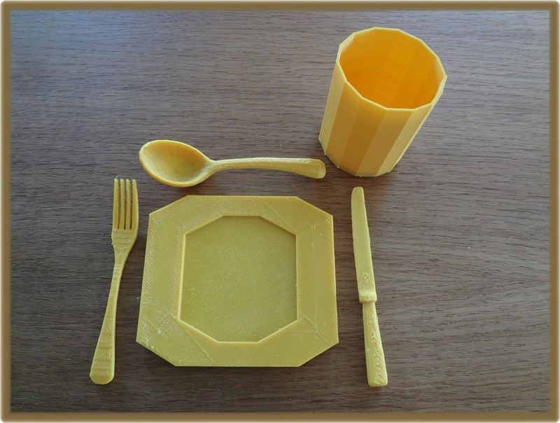cutlery, plate and cup