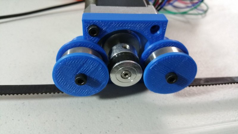 Belt-and-pinion for a standard NEMA motor