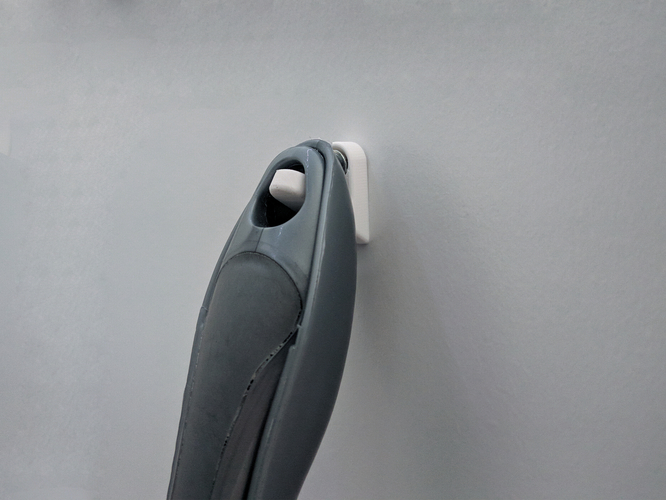 Dust Pan Hanger