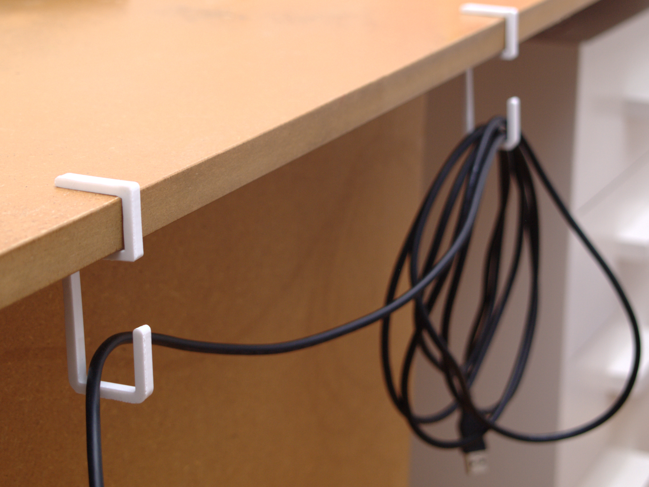 3D Printed Cable Hook for Desk by Florian Artmann