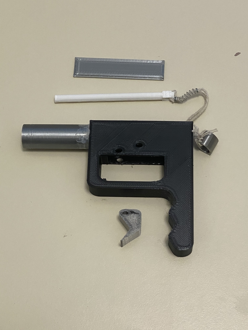 Ball launcher with hand and finger rest