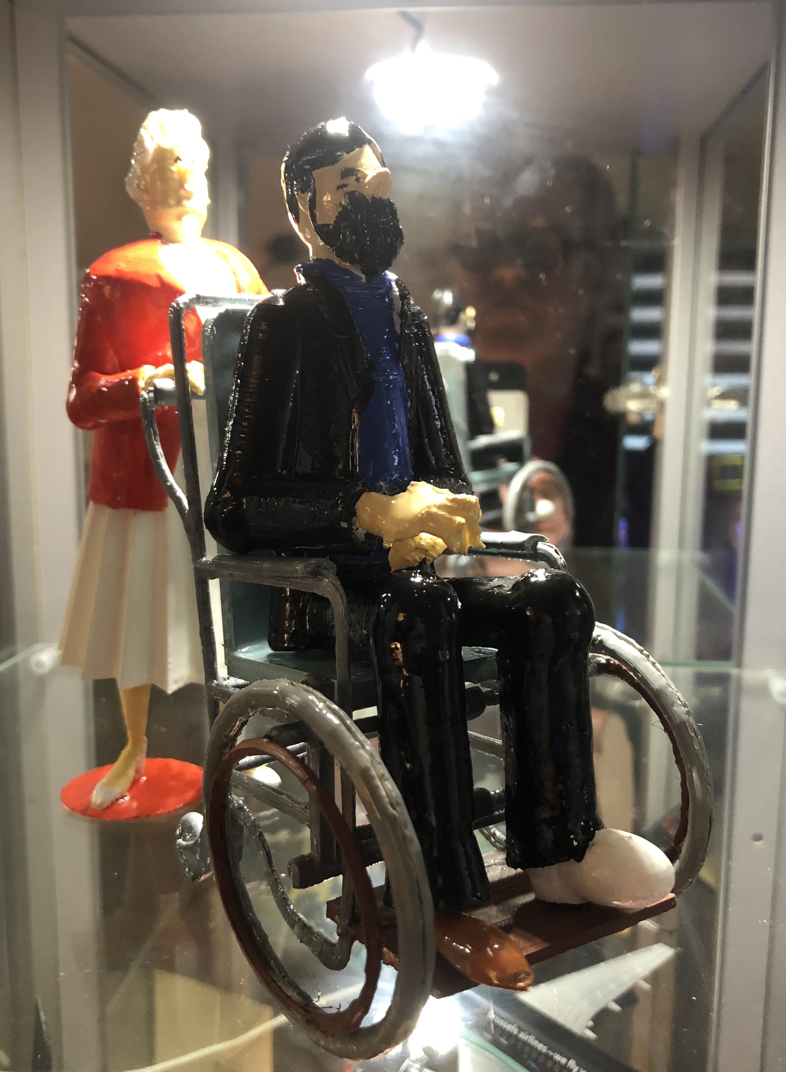 CAPTAIN HADDOCK IN A WHEELCHAIR, PUSHED BY BIANCA
