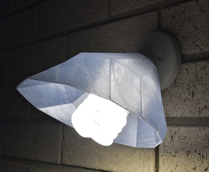 Twisting Lofted Cover for Angled Wall Light