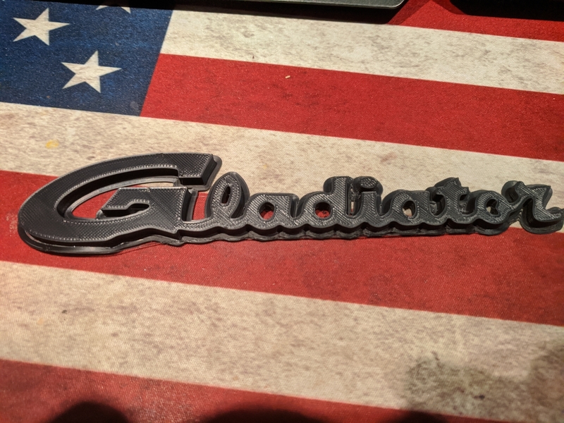 Gladiator Script emblem badge
