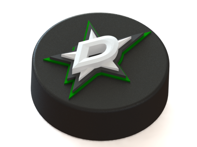 Dallas Stars logo on ice hockey puck.
