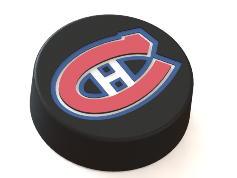 Montreal Canadiens logo on ice hockey puck
