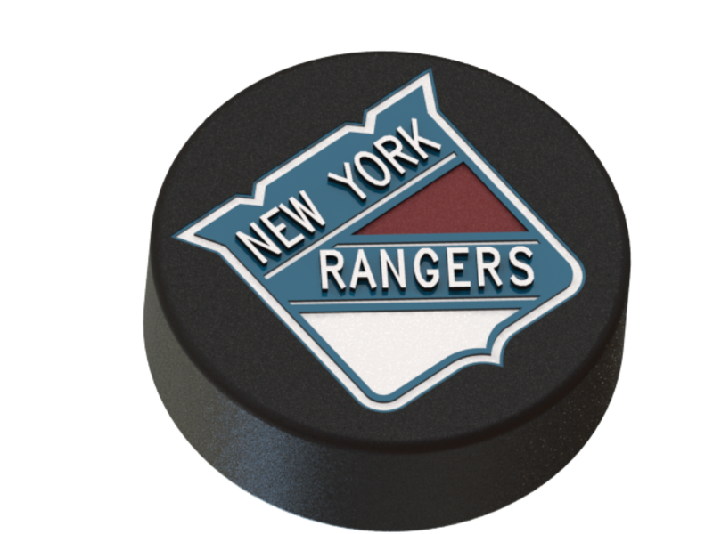 New York Rangers logo  on ice hockey puck