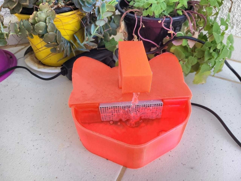 CAT DRINKING FOUNTAIN