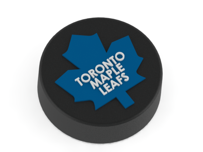 Toronto Maple Leafs logo on ice hockey puck