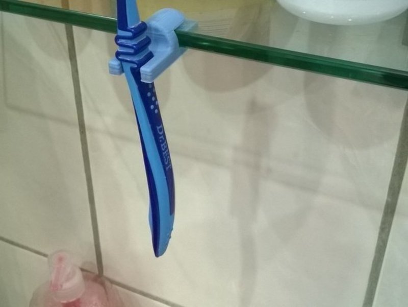 Toothbrush holder for glass board