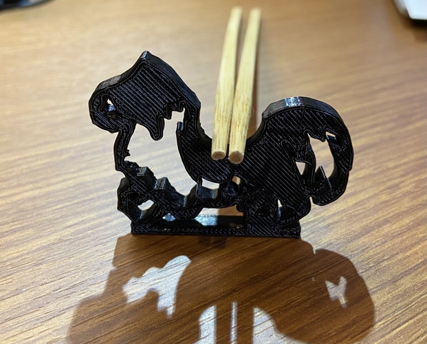 2way chopstick rest of a Border Collie