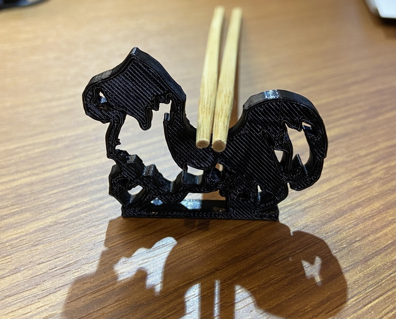 2way chopstick rest of a Border Collie