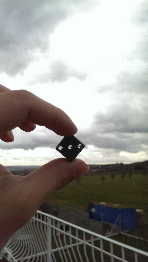 Holey dice
