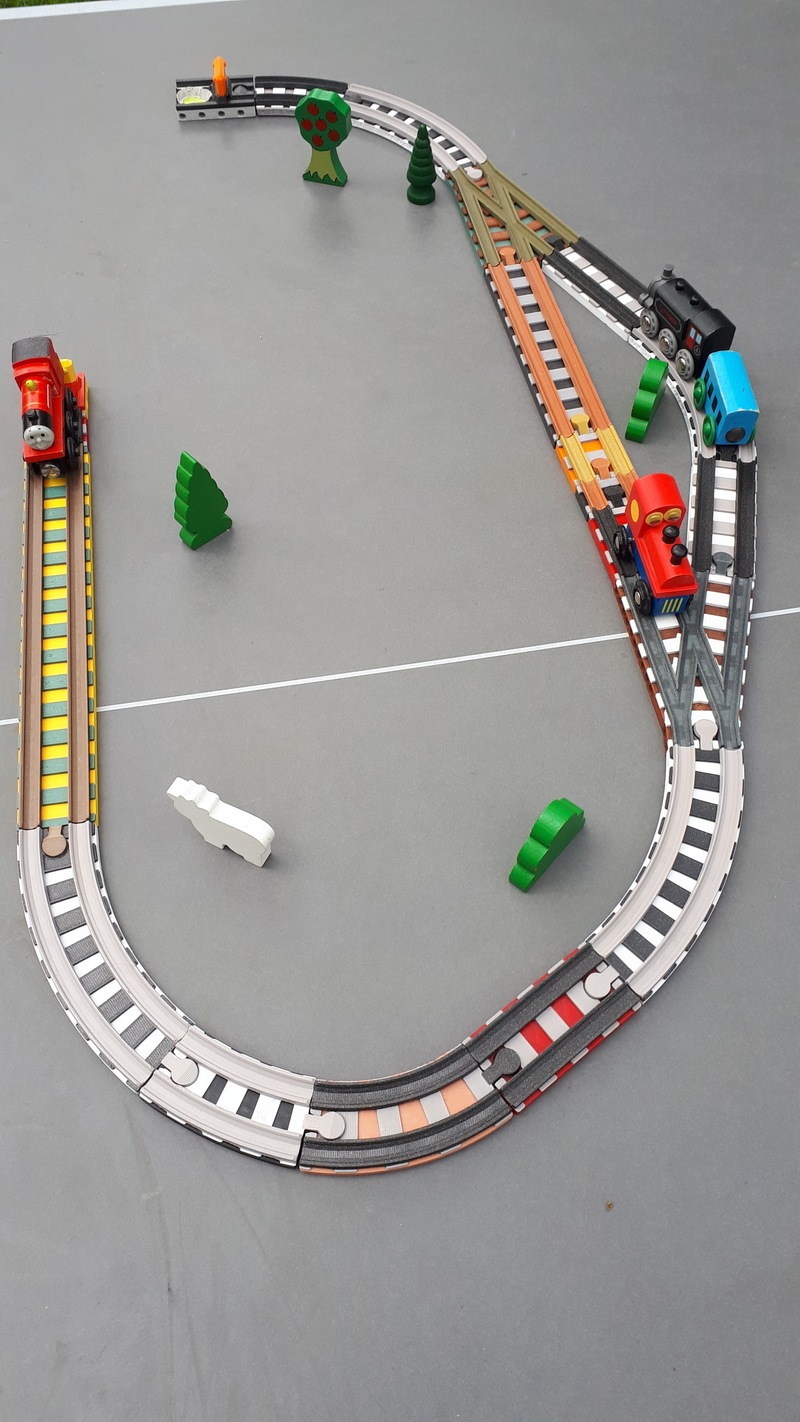 Wooden railway curves with sleepers