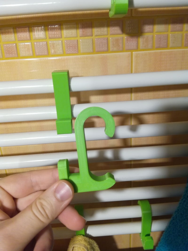 Hook for heated towel rack