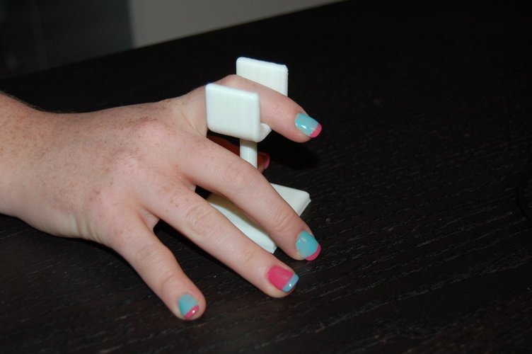 Manicure finger holder.