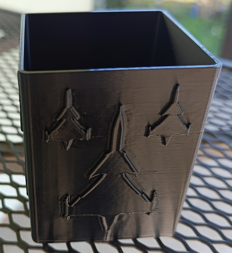 Square pencil case with silhouettes of European fighter planes