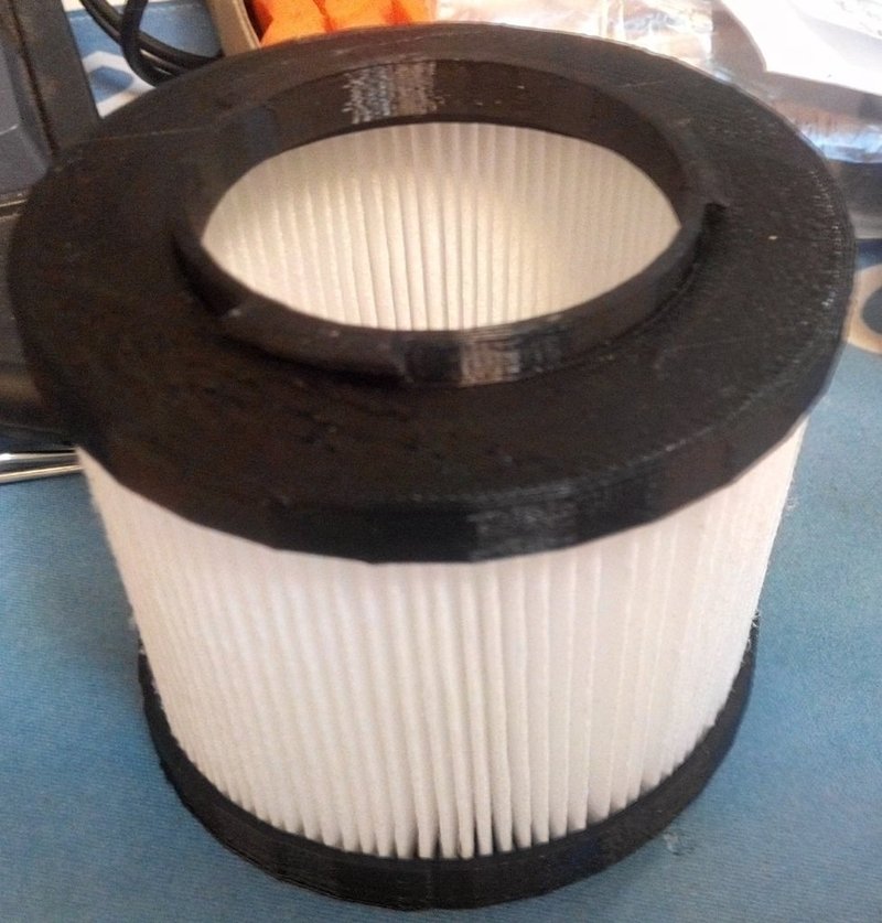 HEPA filter mount for portable vacuum cleaner