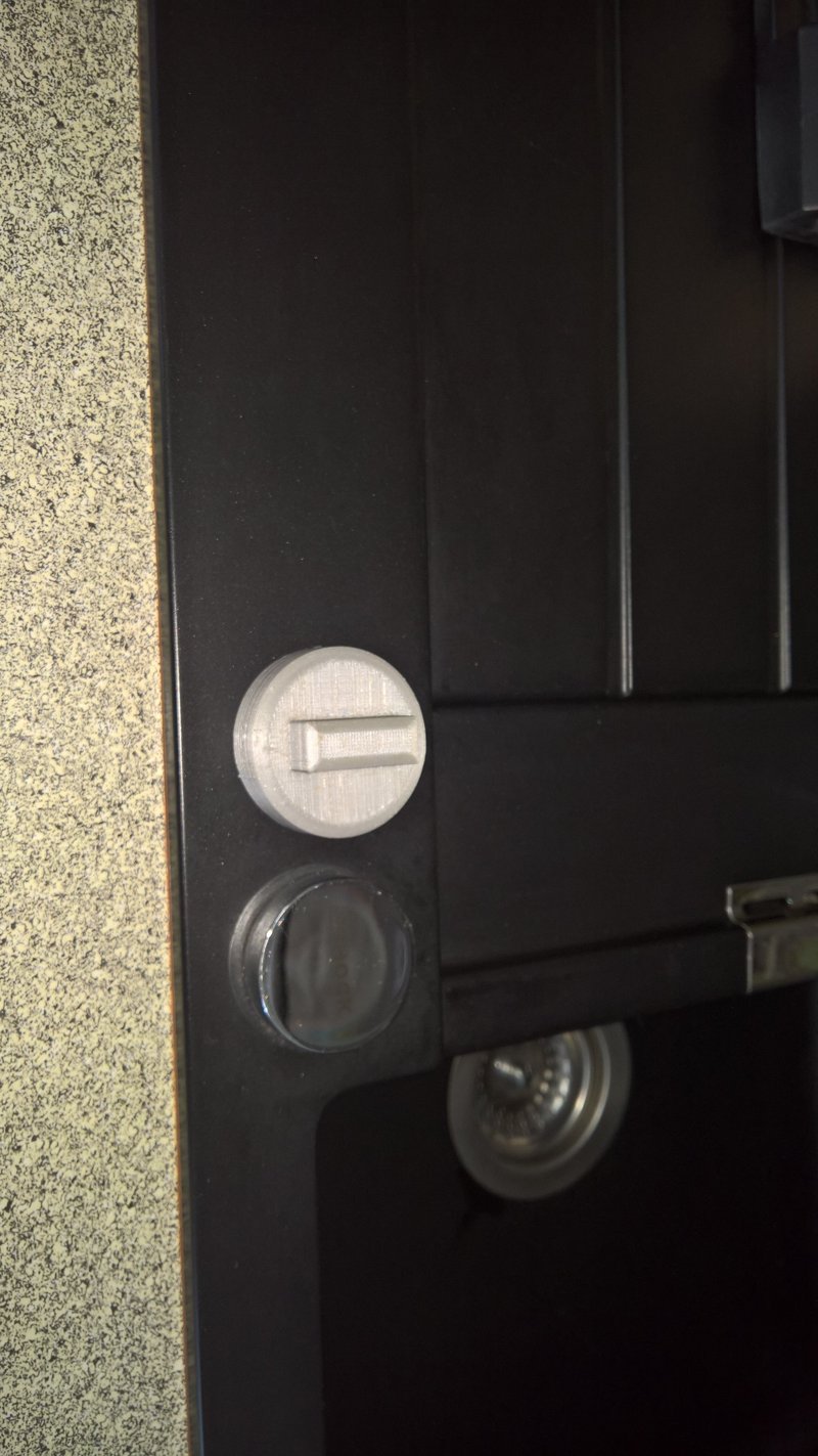 Drain button