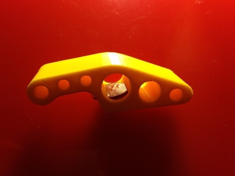 Holey coin-op bottle opener