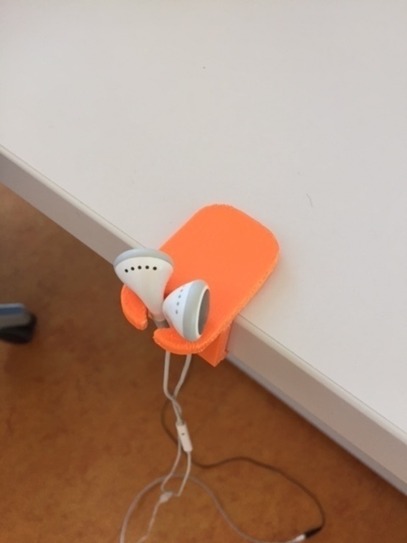 Earphone table holder