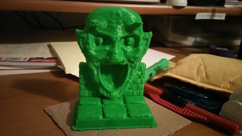 Green Devil Face Wall Section