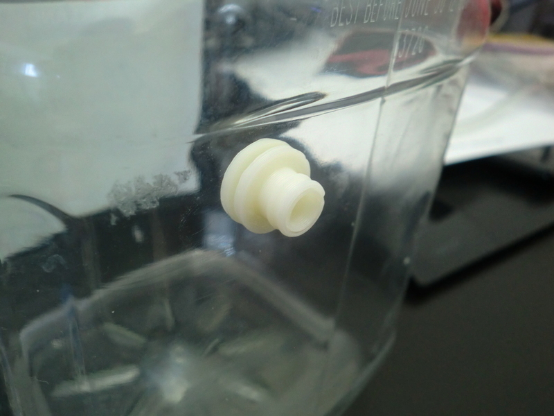 Press-fit tubing-attachment flange for CO2 bubbles experiment.