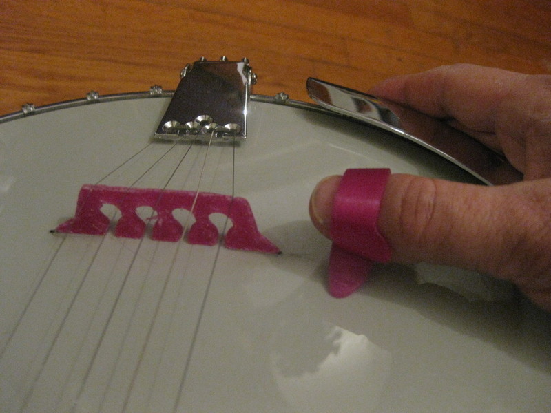 5 string banjo bridge and thumb pick