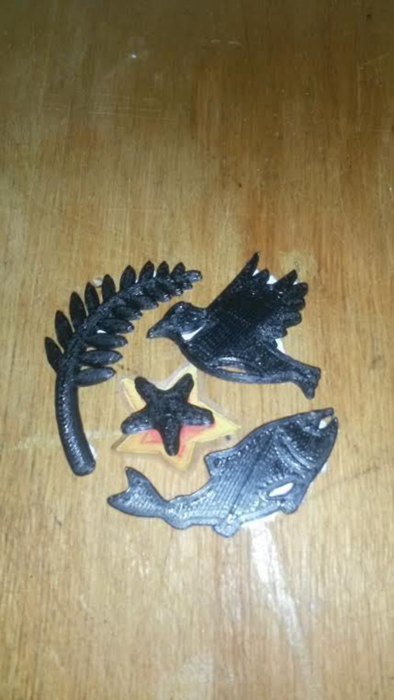 3D logo name tag test print with matching coin